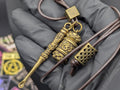 Brown Leather Cord Necklace: Brass Jar & Mini Spoon - Fu Man Chu Style