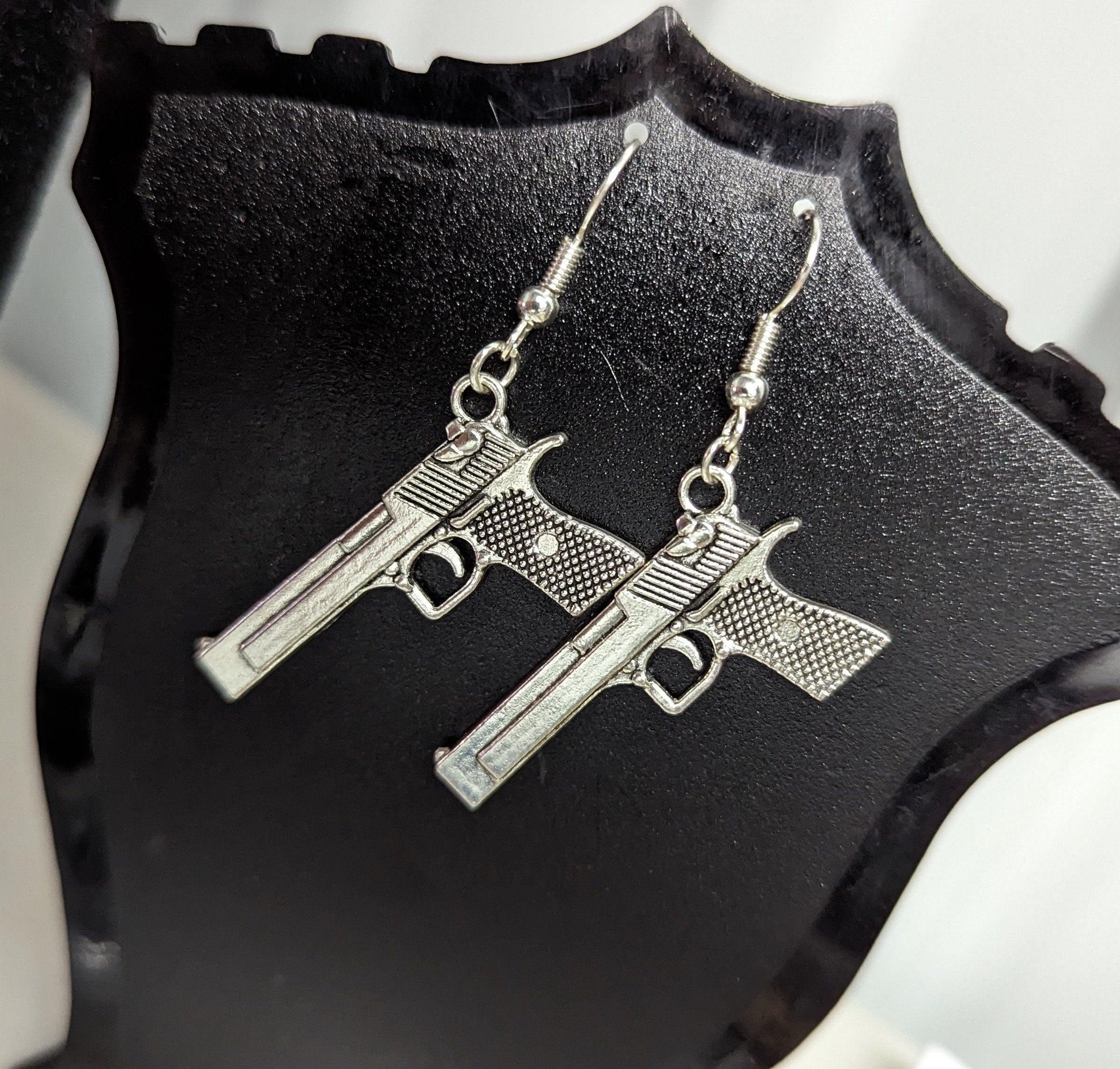 Big Cal Pistol Silver Finish Dangling Hook Earrings